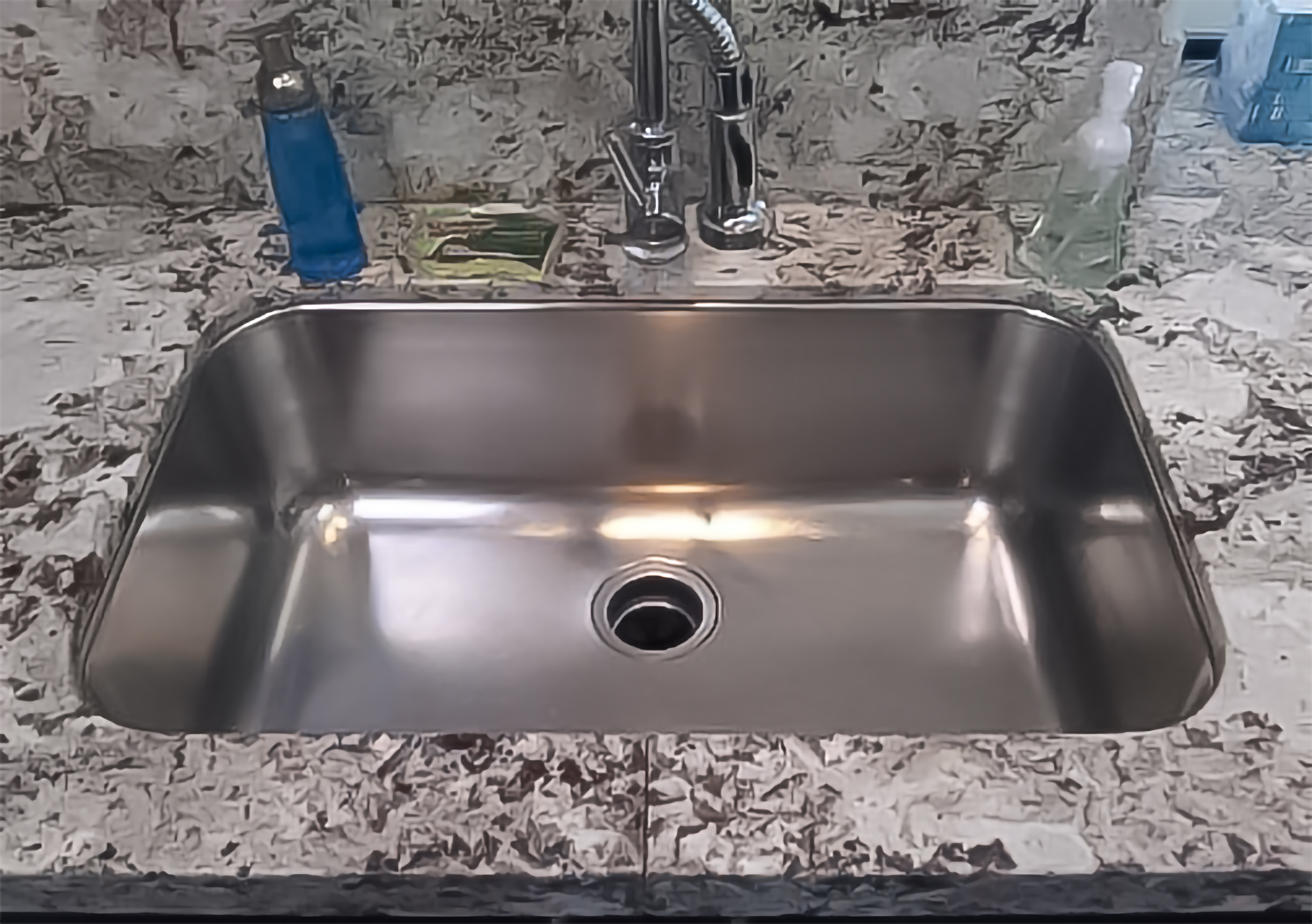 Spotless stainless steel kitchen sink — It Needs to be Perfect LLC
